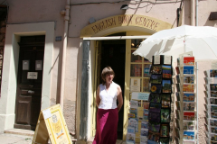 Jill manning the shop doorway